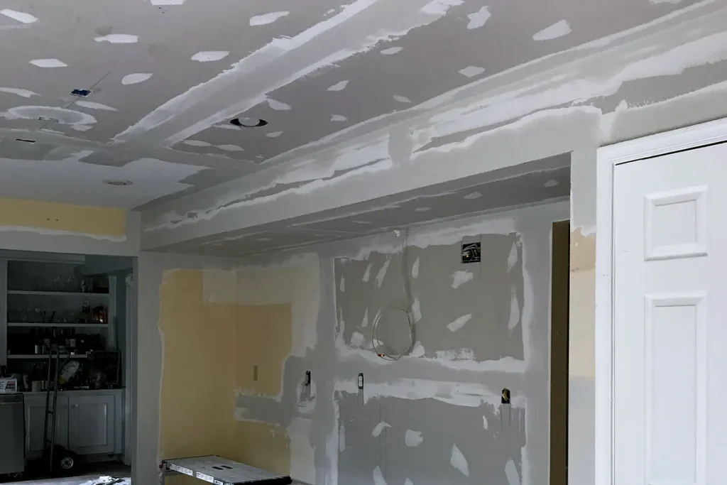 drywall installation in edgewater md - 3 Handyman working on drywall installation in Edgewater MD